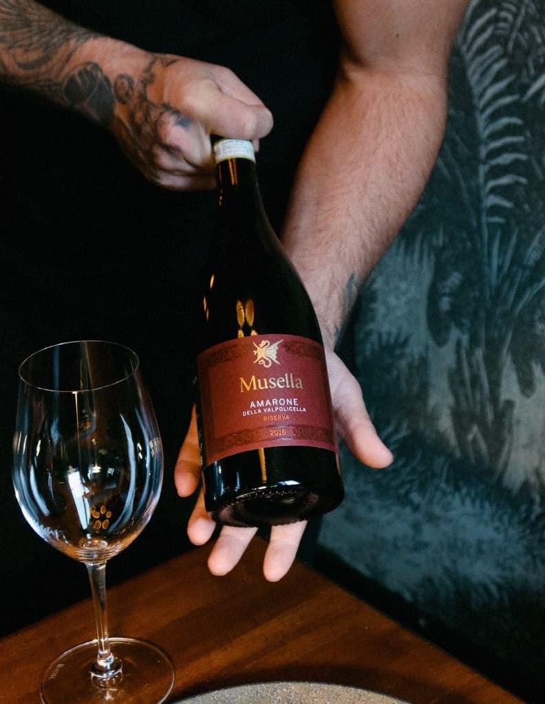Musella Amarone wine bottle and Riedel glass at Somewhere Dine Bar, Ottawa